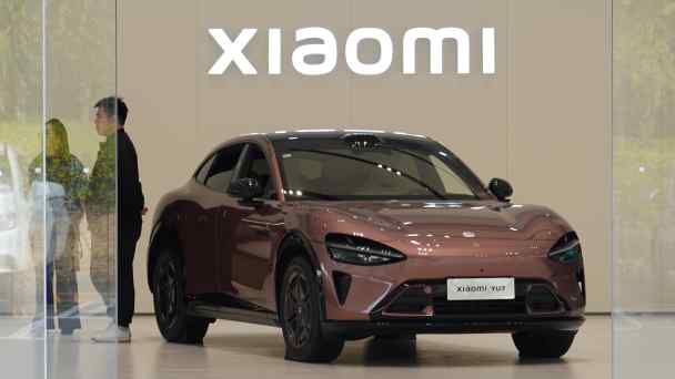 A Xiaomi electric car is displayed in showroom in the Chinese city of Changzhou on Nov. 2. 